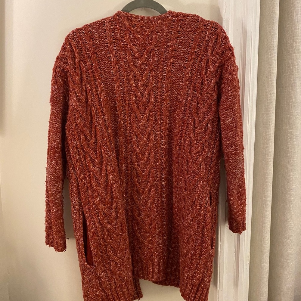 Red wool sweater with pockets